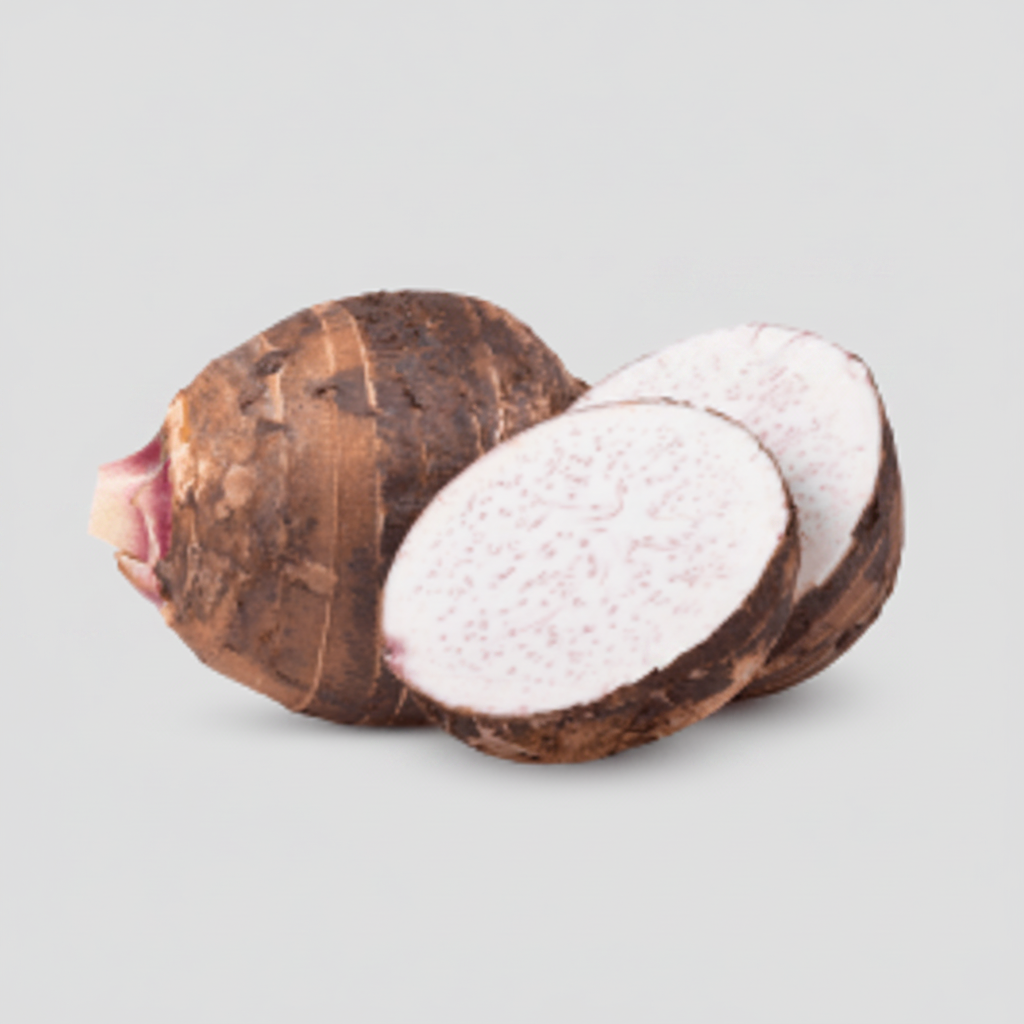 A whole and sliced taro root with a rough brown skin and a pale white interior, isolated on a white background.