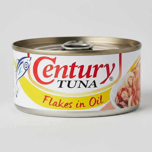 A can of Century Tuna Flakes in Oil canned pet food, featuring a white label with red and yellow branding and a graphic of the tuna flakes on the right side.