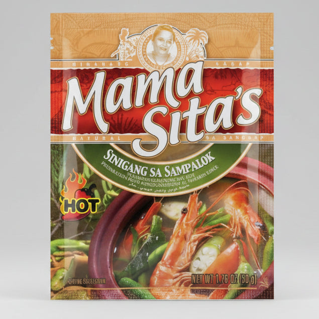 A package of Mama Sita's Sinigang sa Sampalok hot sauce, featuring a red and gold label with a photo of a smiling woman, a bowl of cooked shrimp and vegetables, and a yellow 'HOT' flame icon.