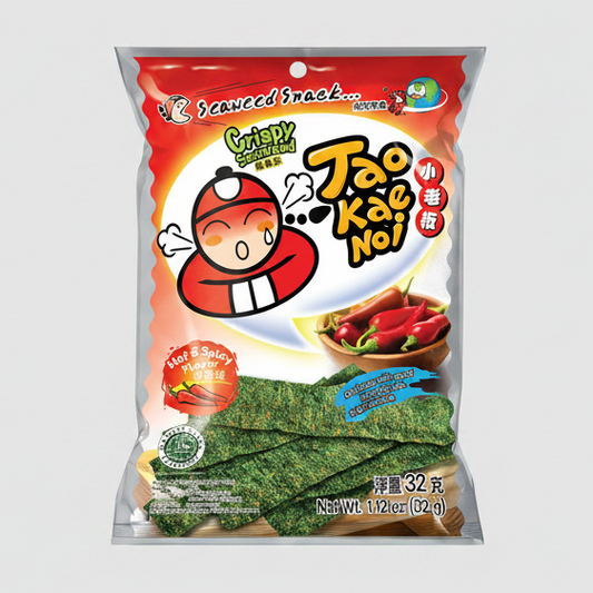 A bag of Tao Kao Noi Crispy Scavenged Seaweed snacks, featuring a red and orange packaging design with a cartoon character, a bowl of red chili peppers, and green seaweed sheets visible through the clear lower section.