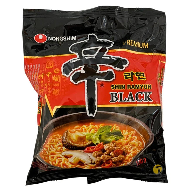 A package of Nongshim Shin Ramyun Black instant noodles on a plain white background. The packaging is primarily black with a bold red central panel, featuring the Nongshim logo and a large black Chinese character.