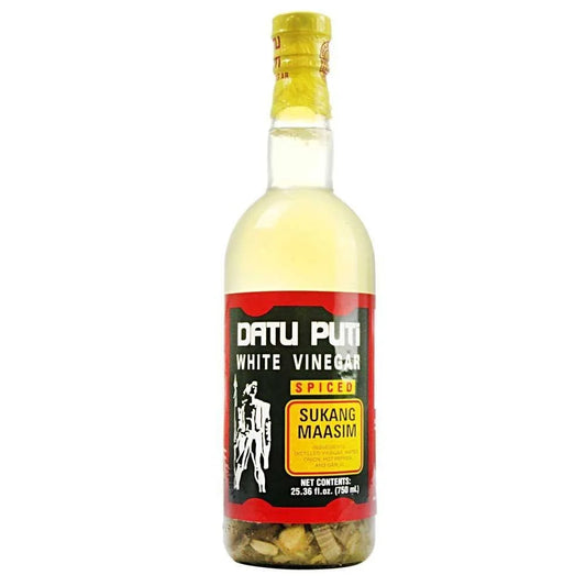 Bottle of Datu Puti White Vinegar with a colorful label on a white background