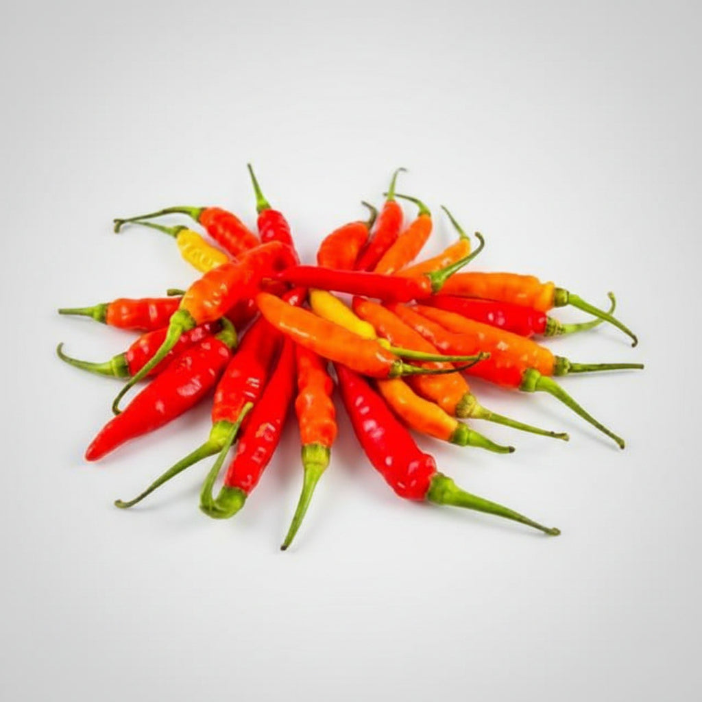 A pile of fresh red and orange chili peppers with green stems, arranged in a circular cluster on a plain white background.