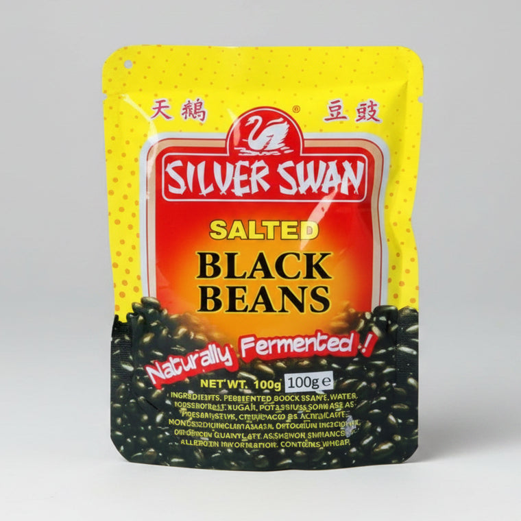 A 100g pouch of Silver Swan Salted Black Beans, featuring a bright yellow and red packaging design with Chinese text and a photo of fermented black beans at the bottom.